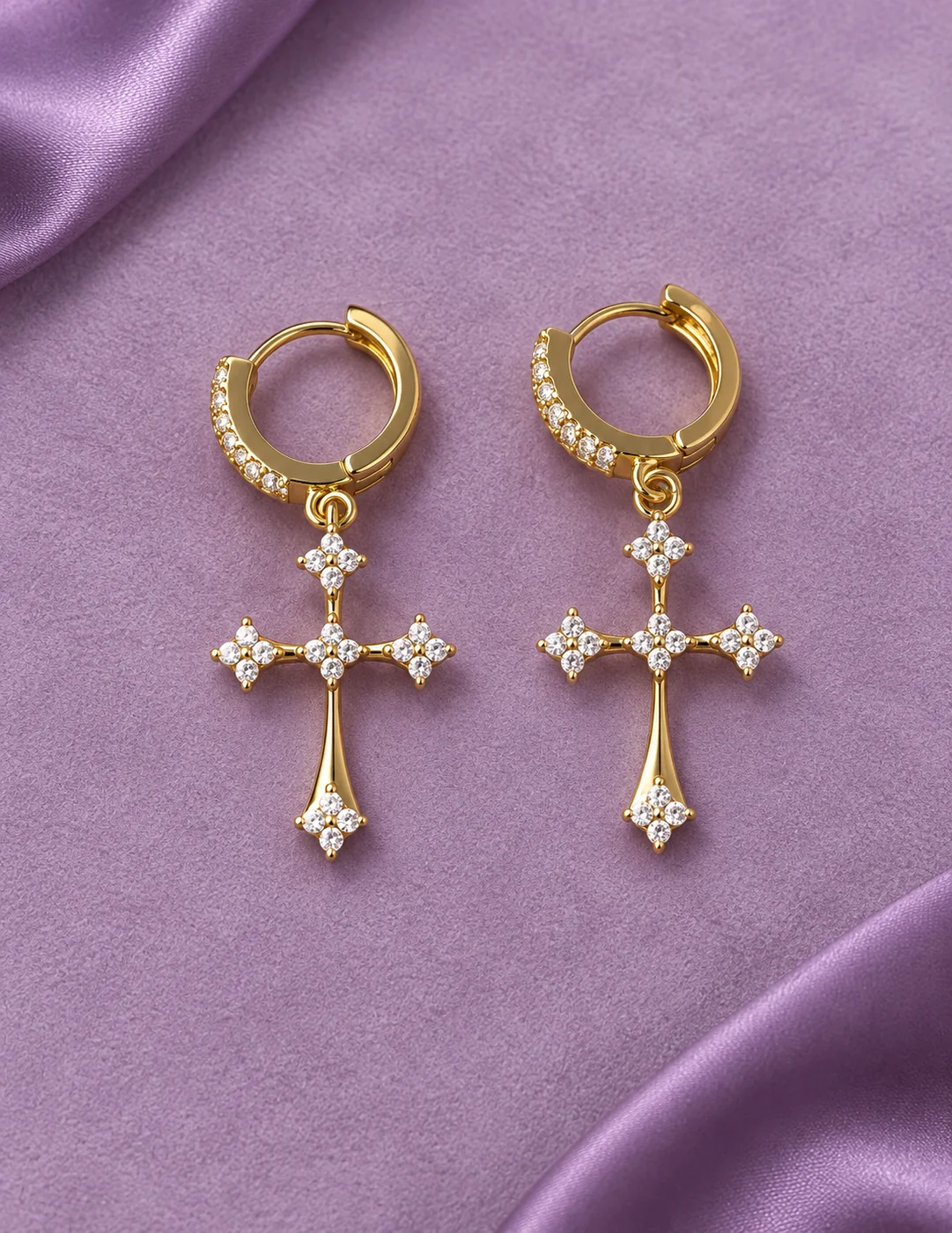 Gold Cross Drop Earrings, front flatlay on stand.